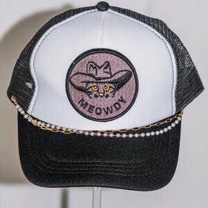 Black and white "Meowdy" trucker hat with hat jewelry